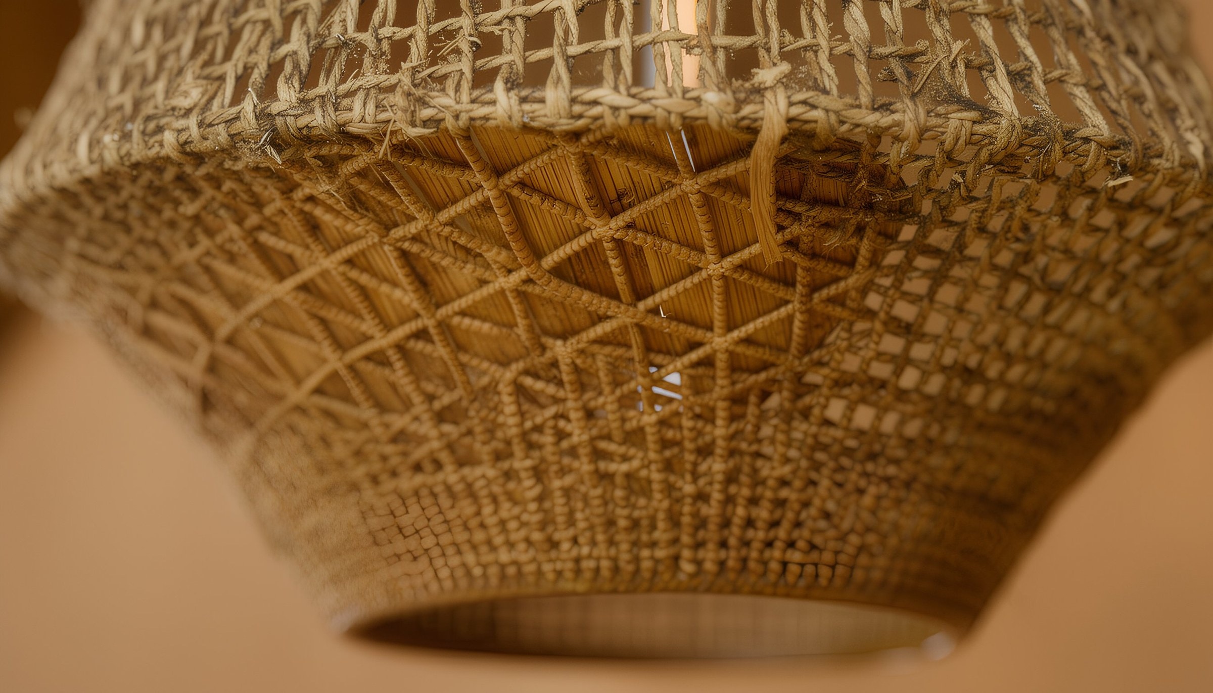 Close-up of a hand-woven bamboo and rattan lampshade